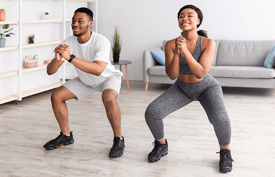 A man and a woman working out